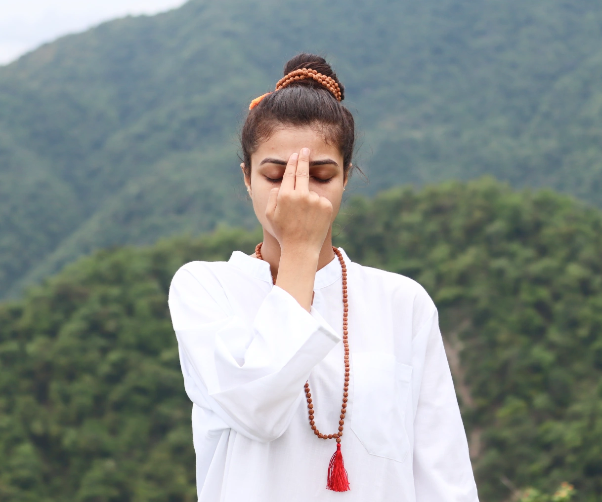 A Girl Doing Pranayam in the mountain