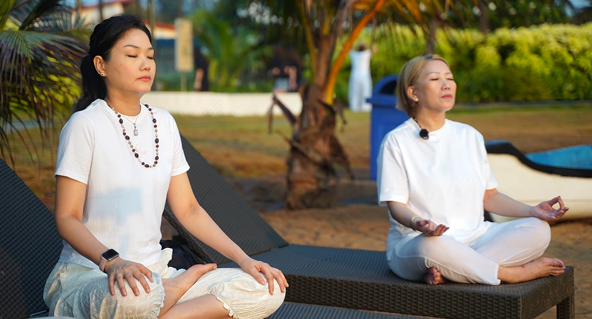 Two students performing mediation at Satbodh school