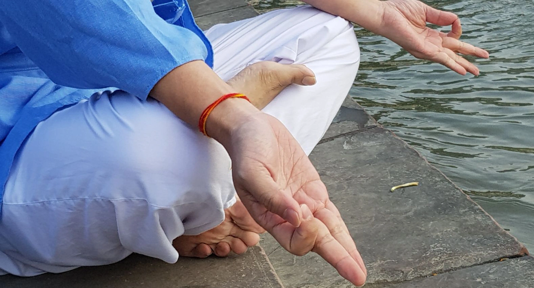 Mudra pose on the bank of river